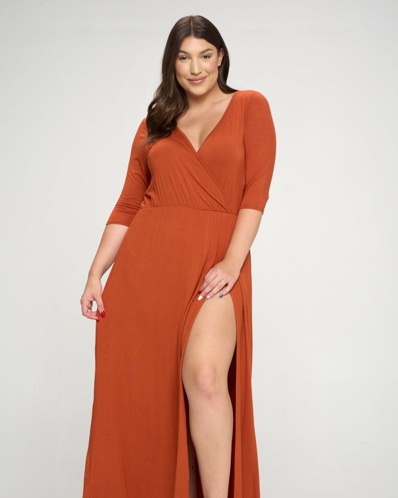 Front of a model wearing a size 1X Nancy Maxi Wrap Dress in Rust by L I V D. | dia_product_style_image_id:241473